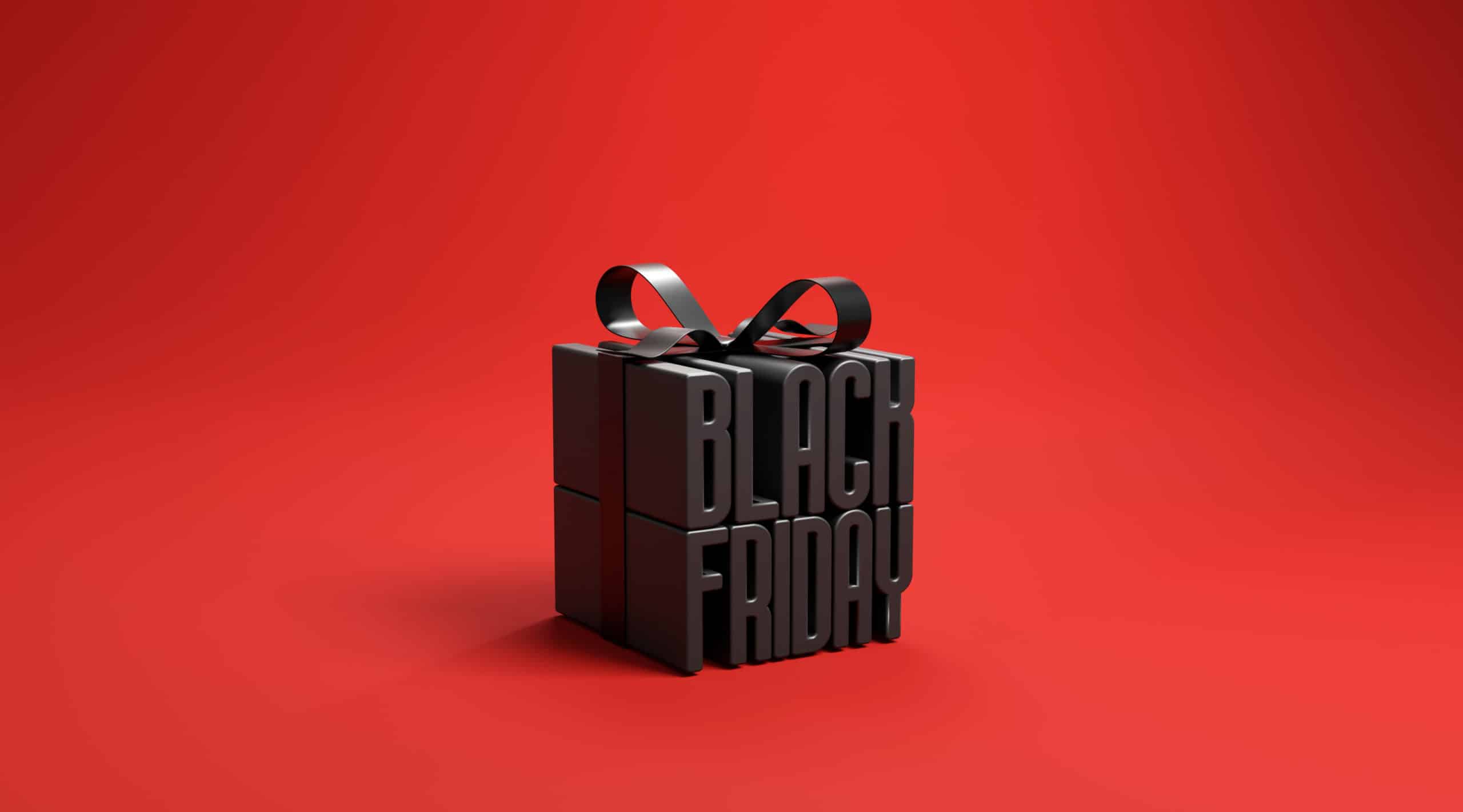 black-friday-gift-box-wrapped-with-black-ribbon-red-background